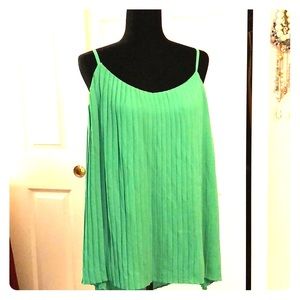 Spaghetti strap ruffled blouse.